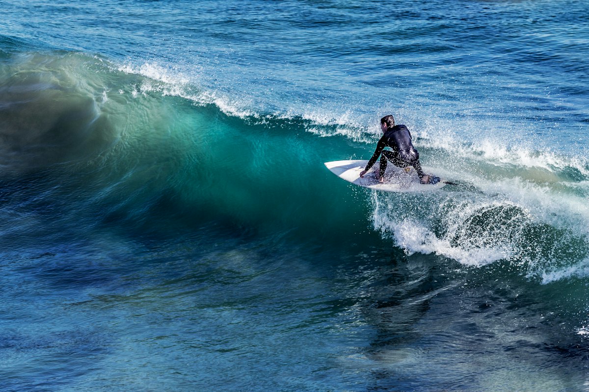 Surfer riding a breaking wave on the Atlantic coast