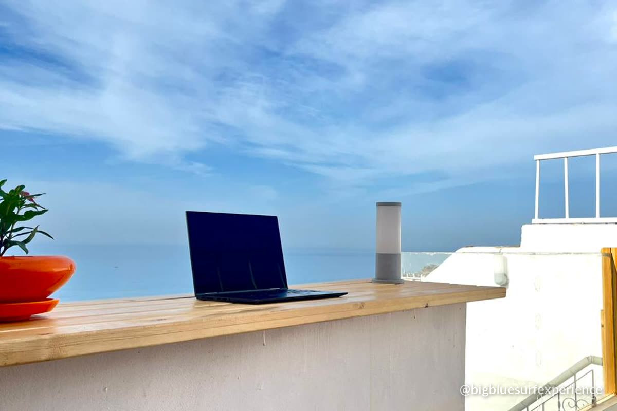 Guest looking out over the Atlantic from the BigBlue rooftop